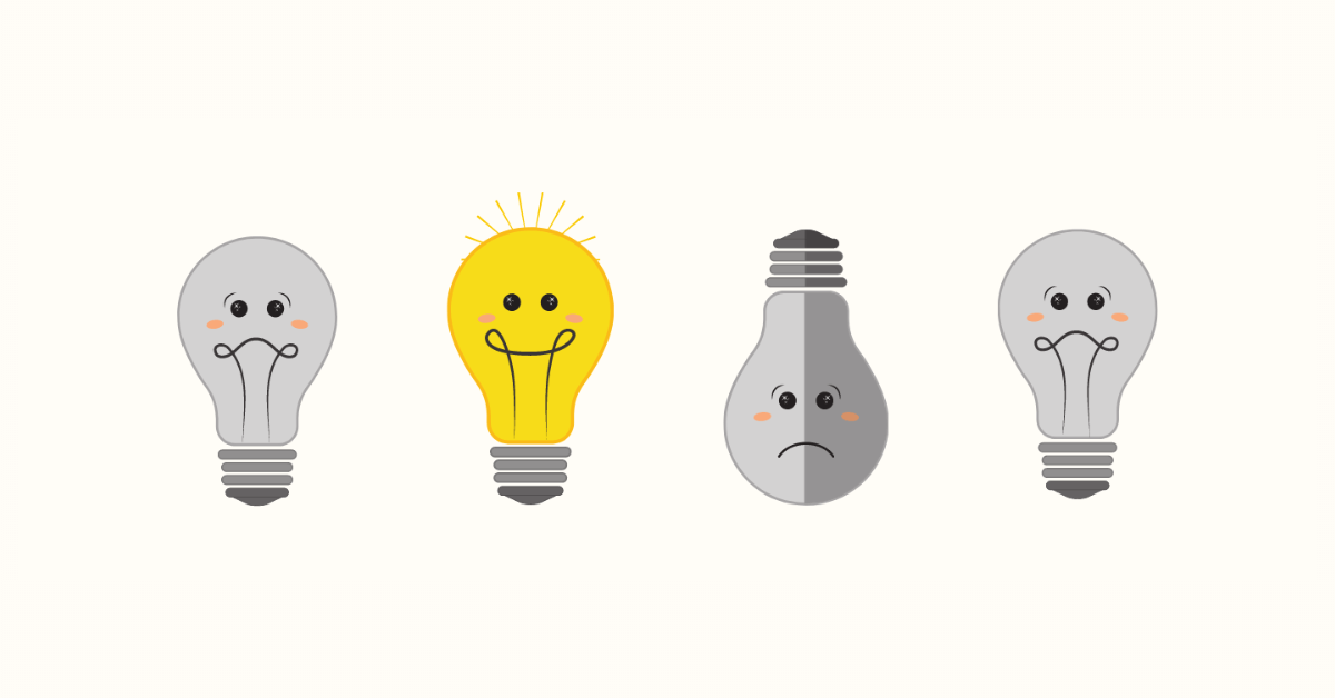 Four lightbulbs, with three appearing dim and unhappy while one shines brightly with happiness